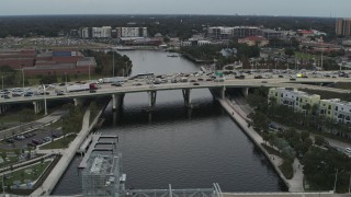 DX0003_231_027 - 5.7K aerial stock footage heavy traffic on a bridge spanning the river in Tampa, Florida