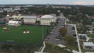 DX0003_231_038 - 5.7K aerial stock footage of orbiting the Tampa Preparatory School campus, Tampa, Florida