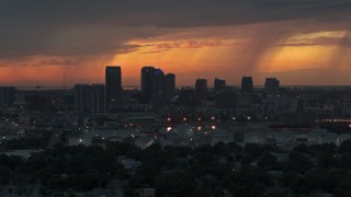 DX0003_232_002 - 5.7K aerial stock footage slowly passing by the Downtown Tampa skyline at twilight, Florida