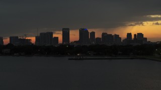 DX0003_232_016 - 5.7K stock footage aerial video a view of skyscrapers in the Downtown Tampa skyline at twilight, Florida