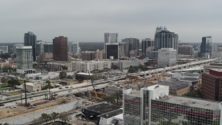 DX0003_233_030 - 5.7K aerial stock footage approach and flyby the city's skyline, Downtown Orlando, Florida