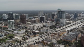 DX0003_233_035 - 5.7K aerial stock footage slowly fly away from the city's skyline, Downtown Orlando, Florida