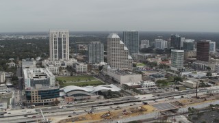 DX0003_233_036 - 5.7K aerial stock footage slowly approach Bank of America Center in Downtown Orlando, Florida