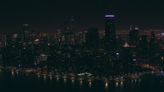 ED01_102 - HD stock footage aerial video of a wide view of Downtown Chicago, Illinois skyscrapers at nighttime