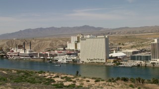 FG0001_000003 - 4K aerial stock footage of Colorado Belle Resort and Edgewater Hotel on the Colorado River in Laughlin, Nevada