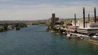 FG0001_000005 - 4K aerial stock footage of passing resort casinos on the Colorado River in Laughlin, Nevada