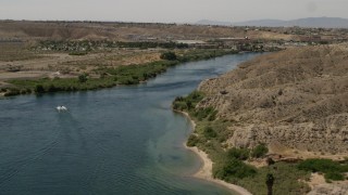 FG0001_000008 - 4K aerial stock footage of a riverfront hotel beside the Colorado River in Bullhead City, Arizona