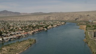 FG0001_000013 - 4K aerial stock footage of waterfront homes on the Colorado River in Bullhead City, Arizona