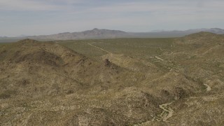 FG0001_000029 - 4K aerial stock footage fly over the Dead Mountains Wilderness Area in the Mojave Desert on the border of Nevada and California