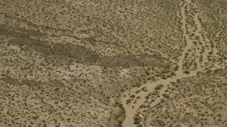 FG0001_000031 - 4K aerial stock footage tilt from a bird's eye view of open desert in Laughlin, Nevada