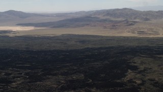 FG0001_000088 - 4K aerial stock footage pan across the lava fields by the Pisgah Crater in Mojave Desert, San Bernardino County, California