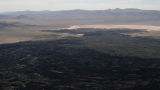 FG0001_000090 - 4K aerial stock footage of the lava fields of the Pisgah Crater in the Mojave Desert, San Bernardino County, California