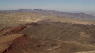 FG0001_000098 - 4K aerial stock footage of Rodman Mountains and colorful striations in the Mojave Desert, San Bernardino County, California