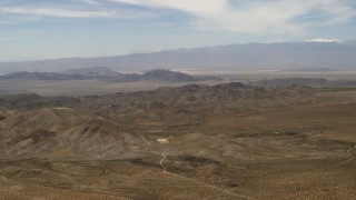 FG0001_000106 - 4K aerial stock footage of the Iron Ridge mountains in the Mojave Desert, San Bernardino County, California