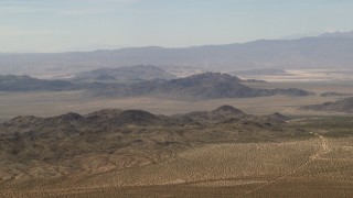 FG0001_000108 - 4K aerial stock footage of the Iron Ridge mountains and small ranges in the Mojave Desert, San Bernardino County, California