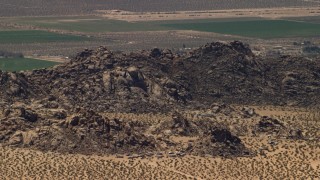 FG0001_000119 - 4K aerial stock footage of the Cougar Buttes in the Mojave Desert, San Bernardino County, California