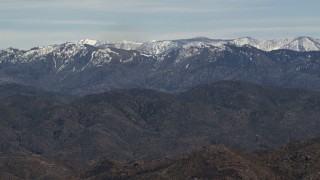 FG0001_000123 - 4K aerial stock footage of snow on the San Bernardino Mountains in California