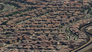 FG0001_000139 - 4K aerial stock footage of rows of suburban tract homes in Rancho Cucamonga, California