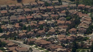 FG0001_000140 - 4K aerial stock footage of tract homes in a suburban neighborhood, Rancho Cucamonga, California