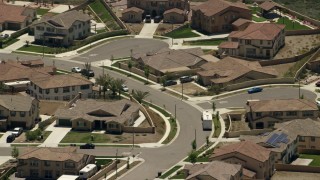 FG0001_000145 - 4K aerial stock footage of residential neighborhood with quiet streets in Rancho Cucamonga, California
