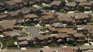 FG0001_000148 - 4K stock footage aerial video of spacious homes in a suburban neighborhood in Rancho Cucamonga, California