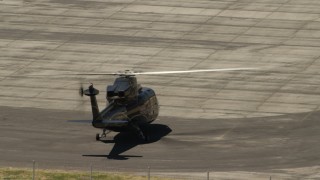 FG0001_000153 - 4K aerial stock footage of a helicopter at Whiteman Airport, Pacoima, California