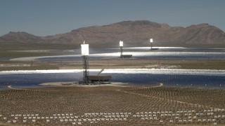 FG0001_000179 - 4K aerial stock footage of three power towers and mirrors of the Ivanpah Solar Electric Generating System in California