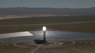FG0001_000189 - 4K aerial stock footage of circling one of the arrays at the Ivanpah Solar Electric Generating System in California