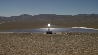 FG0001_000191 - 4K aerial stock footage of circling around one of the arrays at the Ivanpah Solar Electric Generating System in California