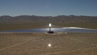 FG0001_000192 - 4K stock footage aerial video of circling around an array at the Ivanpah Solar Electric Generating System in California