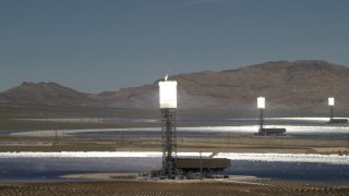FG0001_000196 - 4K aerial stock footage of a trio of arrays at the Ivanpah Solar Electric Generating System in California