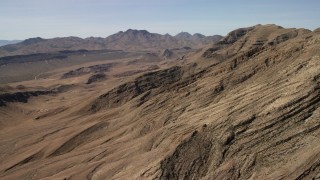 FG0001_000255 - 4K aerial stock footage flyby rough desert mountains in the Nevada Desert