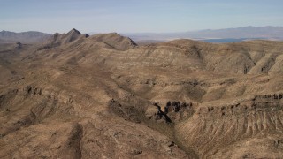 FG0001_000260 - 4K aerial stock footage of steep-sloped mountain ridges in the Nevada Desert