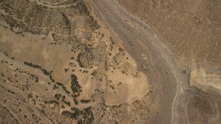 FG0001_000272 - 4K aerial stock footage of an overhead view of flat plain the Nevada Desert