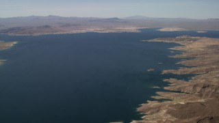 FG0001_000276 - 4K aerial stock footage of a view across Lake Mead, seen from the desert shore in Nevada