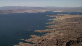 FG0001_000277 - 4K aerial stock footage of a view across Lake Mead and the desert shore, Nevada