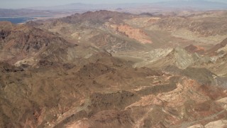 FG0001_000286 - 4K aerial stock footage fly over barren mountains near Lake Mead in the Nevada Desert