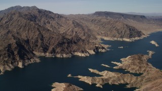 FG0001_000294 - 4K aerial stock footage of desert mountains on the shore of Lake Mead, Nevada