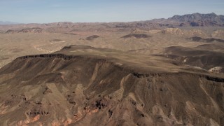 FG0001_000299 - 4K stock footage aerial video of a mesa in the barren landscape of the Nevada Desert