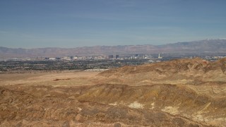 FG0001_000304 - 4K stock footage aerial video of Las Vegas, Nevada seen from barren desert mountains outside the city