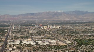 FG0001_000312 - 4K aerial stock footage approach Downtown Las Vegas hotels and casinos from I-515, Nevada