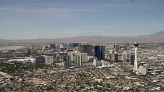 FG0001_000317 - 4K stock footage aerial video of Stratosphere and hotels and casinos on the Las Vegas Strip in Nevada