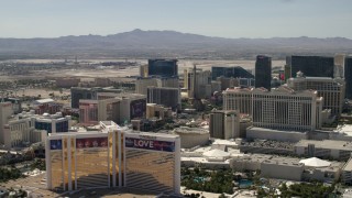 FG0001_000324 - 4K aerial stock footage of The Mirage, Flamingo, Paris Las Vegas, and Caesar's Palace on the Las Vegas Strip in Nevada