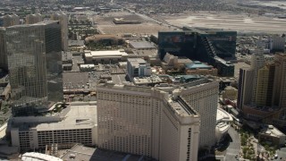 FG0001_000327 - 4K aerial stock footage flyby Aria on the Las Vegas Strip in Nevada to reveal Monte Carlo, MGM Grand and New York New York