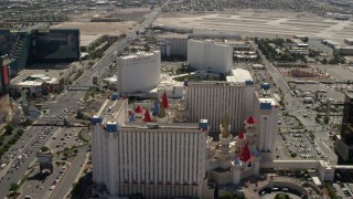 FG0001_000328 - 4K aerial stock footage of the Tropicana and Excalibur on Tropicana Avenue, and reveal Luxor on the Las Vegas Strip, Nevada