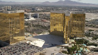 FG0001_000329 - 4K aerial stock footage flyby the Delano and Mandalay Bay, and reveal Luxor between them on the Las Vegas Strip, Nevada