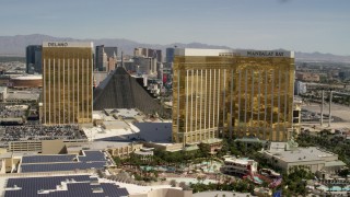 FG0001_000330 - 4K stock footage aerial video flyby the Delano, Luxor and Mandalay Bay, and reveal Las Vegas Boulevard on the Las Vegas Strip, Nevada