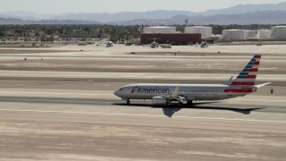 FG0001_000332 - 4K aerial stock footage of an American Airlines commercial jet at McCarran Airport, Las Vegas, Nevada