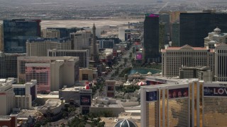 FG0001_000346 - 4K aerial stock footage of Las Vegas Boulevard, Paris Las Vegas, and Bally's on the Las Vegas Strip, Nevada