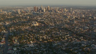 HDA06_14 - HD stock footage aerial video Downtown Los Angeles skyscrapers seen from Echo Park neighborhoods at sunset, California